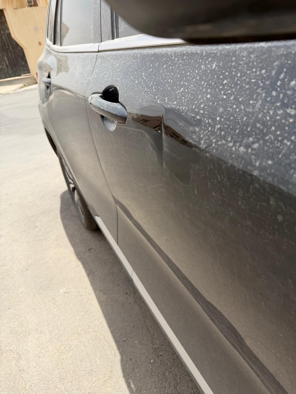 صورة قبل إصلاح باب أمامي - BMW